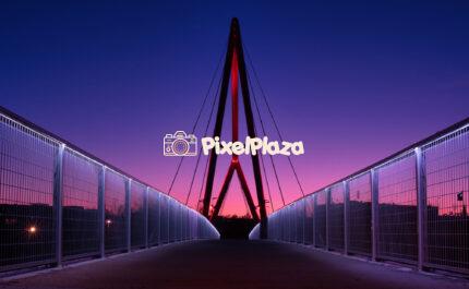 Symmetrical View of Modern Pedestrian Bridge at Twilight